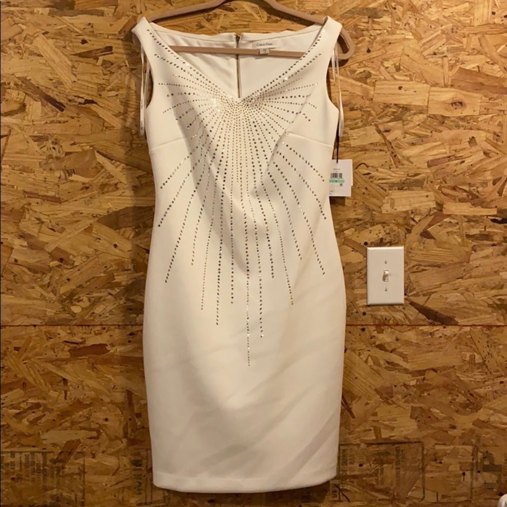 Never worn! Calvin Klein dress. Beautiful details